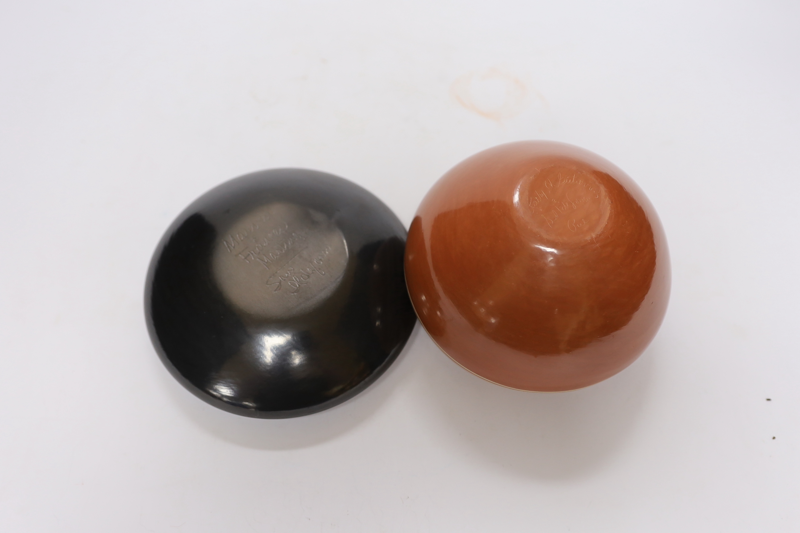 Two North American studio pottery vessels; a Marvin and Frances Martinez pottery bowl and a Kathy Gutierrez burnished bowl, tallest 10cm